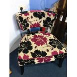 A purple and black, modern floral design bedroom chair