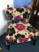 A purple and black, modern floral design bedroom chair