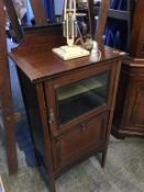 An Edwardian mahogany music cabinet