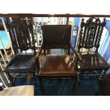A pair of carved oak chairs and a carver chair