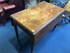 A 19th century mahogany Pembroke table with single drawer