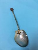 A mother of pearl spoon, with Cameo finial