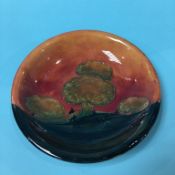 A Moorcroft 'Eventide' shallow dish, 19cm diameter