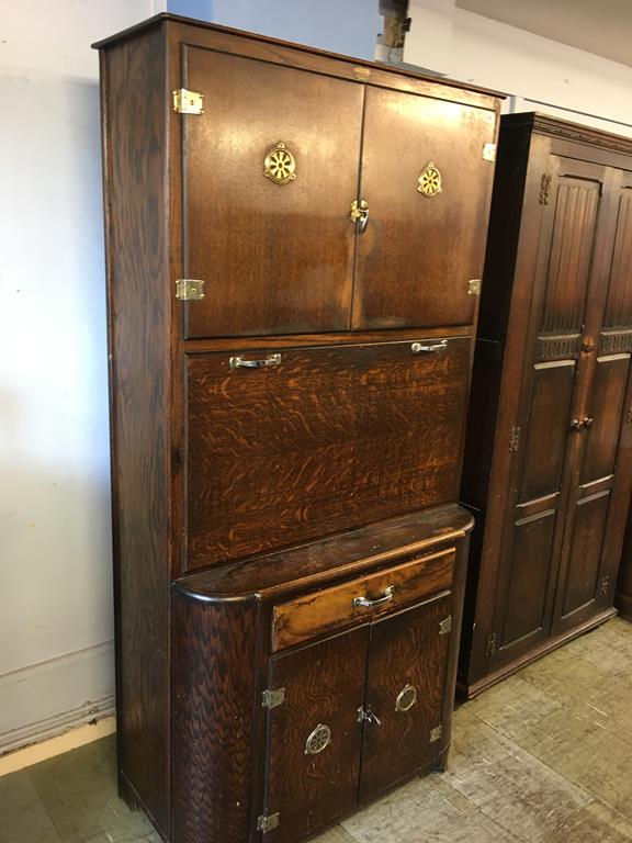 An oak kitchen cabinet