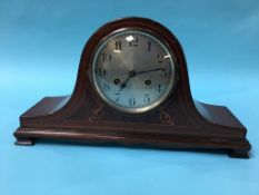 A mahogany mantle clock