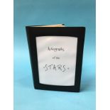 An autograph book to include; Richard Attenborough, Edward Woodward, Bob Monkhouse, Ian McShane,