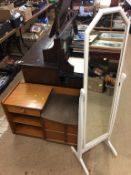 A teak telephone seat and cheval mirror