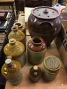 A collection of stoneware flagons