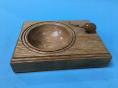 An oak ashtray, mounted with an acorn