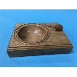 An oak ashtray, mounted with an acorn