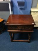 An oak Old Charm side table, 56cm wide