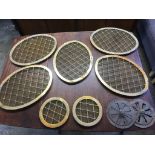 Five oval metalwork grills, two circular and two vents