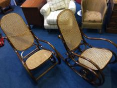 A pair of modern bentwood and bergère rocking chairs