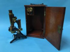 A cased microscope by Baker, 244 High Holborn, London