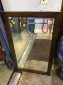 An oak framed mirror