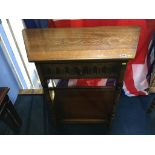 An oak single drawer side table