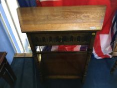 An oak single drawer side table