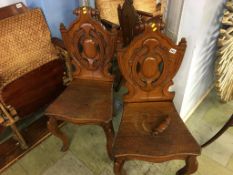 A pair Victorian oak hall chairs