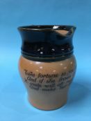 A Royal Doulton stoneware water jug 'Take fortune as you can find her'