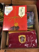 A collection of Harry Potter related books and collectables