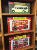 Three boxes of Die Cast buses