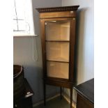 An Edwardian standing corner cabinet