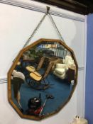 A walnut framed Deco mirror