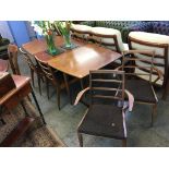A teak McIntosh extending dining table and a set of six chairs