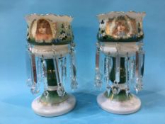 A pair of Victorian opaque glass lustres, decorated with a portrait of children and flowers, with