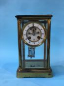 A four glass eight day clock, with strike action