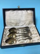 Eleven spoons, stamped '800', weight 110 grams