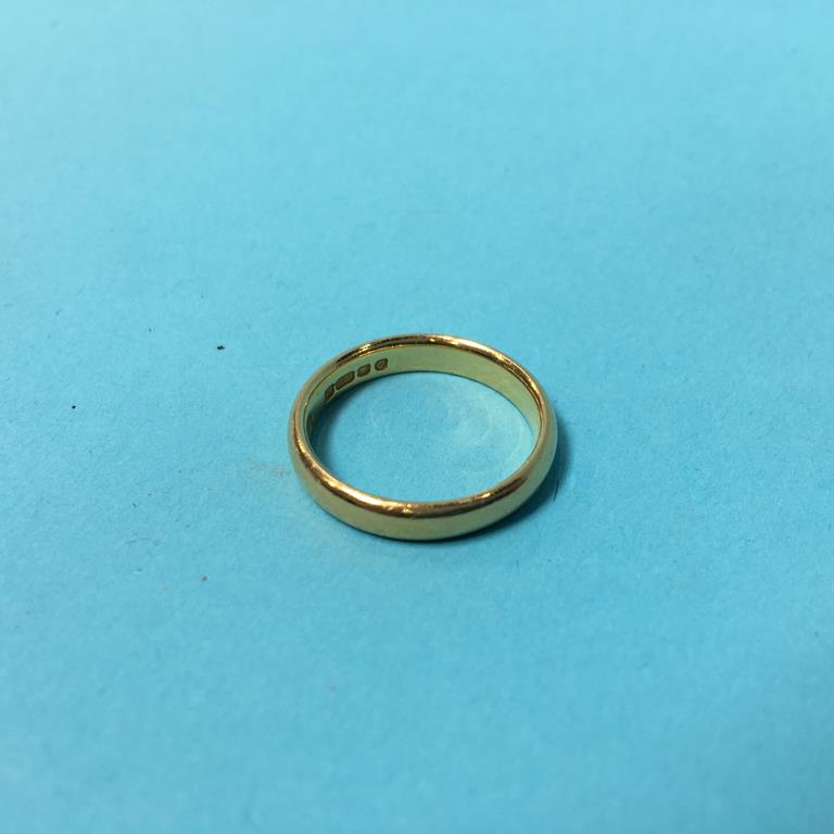 A 22ct wedding band, size J, weight 3.8 grams