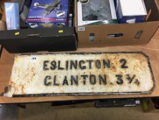 A cast road sign 'Eslington'