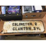 A cast road sign 'Eslington'