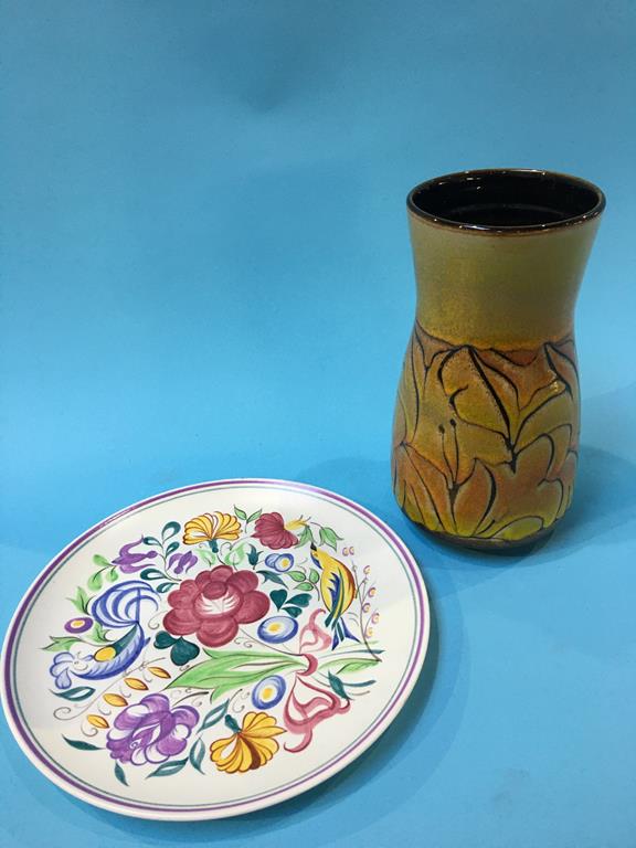 A Poole pottery vase and a plate