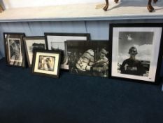 A collection of framed photographic prints