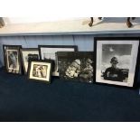 A collection of framed photographic prints