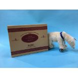 A boxed Steiff Club Edition 1999/2000, number 03109, Polar Bear on wheels