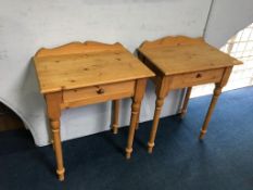 A pair of pine single drawer side tables