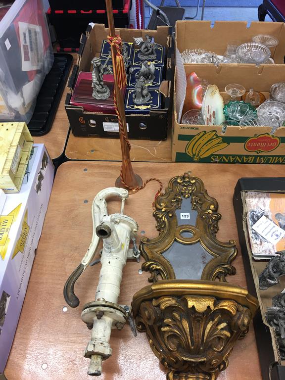 A water pump, gilt sconce and a hunting horn