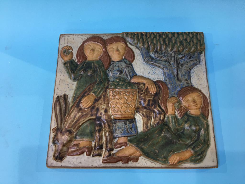 A Continental pottery relief plaque