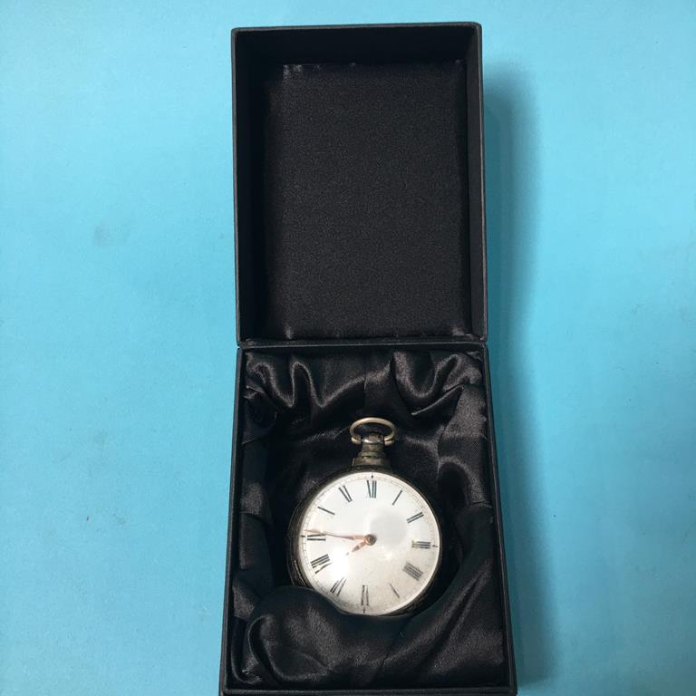 A silver pair cased pocket watch