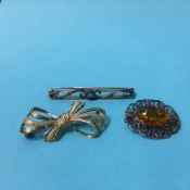 Two 9ct gold brooches and one other (3)