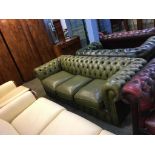 A Chesterfield green three seater settee