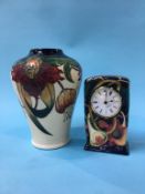 A Modern Moorcroft vase and a table clock
