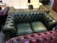 A Chesterfield green two seater settee