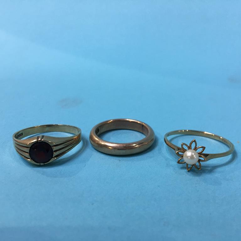 Two 9ct rings, total weight 3.5 grams, and a 10kt ring, 5.2 grams