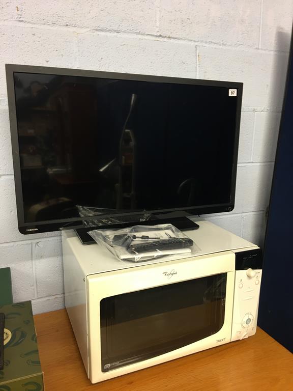 A Toshiba TV and a microwave
