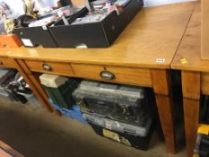 An oak two drawer desk