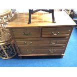 A walnut straight front chest of drawers. 90cm wide